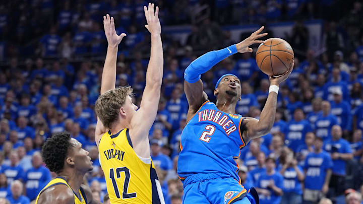Jun 8, 2025; Oklahoma City, Oklahoma, USA; Oklahoma City Thunder guard Shai Gilgeous-Alexander (2) shoots the ball against Indiana Pacers forward Johnny Furphy (12) during the second half during game two of the 2025 NBA Finals at Paycom Center. Mandatory Credit: Kyle Terada-Imagn Images