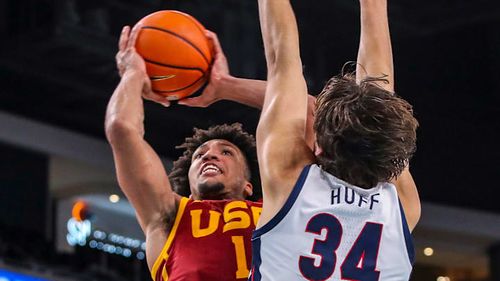 USC Trojans guard Desmond Claude (1) takes a shot over Gonzaga Bulldogs forward Braden Huff (34) during the second half of their exhibition game at Acrisure Arena in Palm Desert, Calif., Saturday, Oct. 26, 2024.