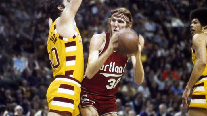 Jan 16, 1975; Richfield, OH, USA; FILE PHOTO; Portland Trailblazers center Bill Walton (32) is defended by Cleveland Cavaliers center Steve Patterson (50) at Richfield Coliseum. Mandatory Credit: Dick Raphael-USA TODAY Sports Jan 16, 1975; Richfield, OH, USA; FILE PHOTO; Portland Trailblazers center Bill Walton (32) is defended by Cleveland Cavaliers center Steve Patterson (50) at Richfield Coliseum. Mandatory Credit: Dick Raphael-USA TODAY Sports