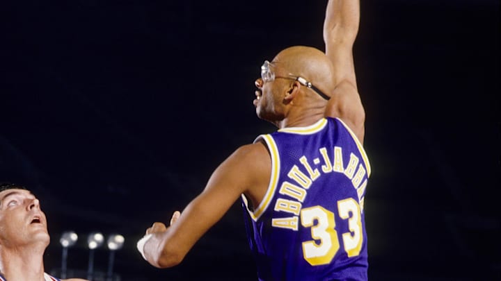 Jun 1988; Detroit, MI, USA; FILE PHOTO; Los Angeles Lakers center Kareem Abdul-Jabbar (33) shoots over Detroit Pistons center Bill Lambier (40) during the 1988 NBA Finals at the Silverdome. Mandatory Credit: MPS-Imagn Images