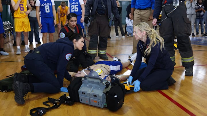 CHICAGO FIRE -- "On The Hook" Episode 12005 -- Pictured: (l-r) Hanako Greensmith as Violet Mikami, Miranda Rae Mayo as Stella Kidd, Christian Stolte as Randy "Mouch" McHolland, Kara Killmer as Sylvie Brett -- (Photo by: Adrian S Burrows Sr/NBC)