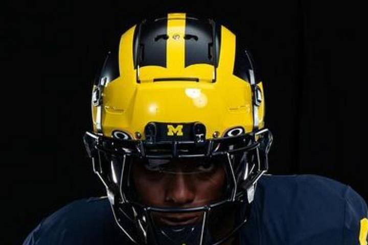 Michigan switches back to more traditional look for football helmet Michigan switches back to more traditional look for football helmet