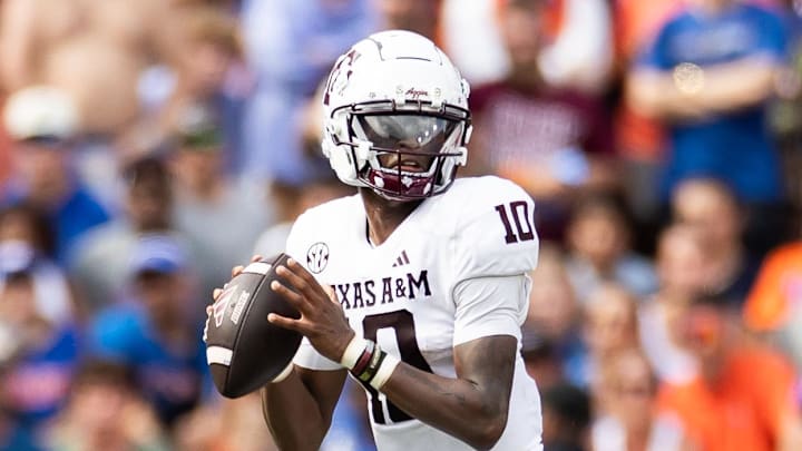 Sep 14, 2024; Gainesville, Florida, USA; Texas A&M Aggies quarterback Marcel Reed (10) looks to throw against the Florida Gators during the first half at Ben Hill Griffin Stadium. Mandatory Credit: Matt Pendleton-Imagn Images