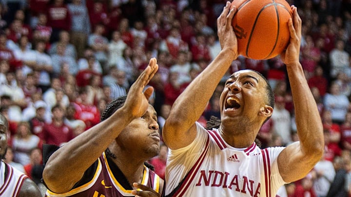 Indiana's Bryson Tucker looks to shoot over Minnesota's Frank Mitchell in December. Tucker has joined the UW now. Indiana's Bryson Tucker looks to shoot over Minnesota's Frank Mitchell in December. Tucker has joined the UW now.