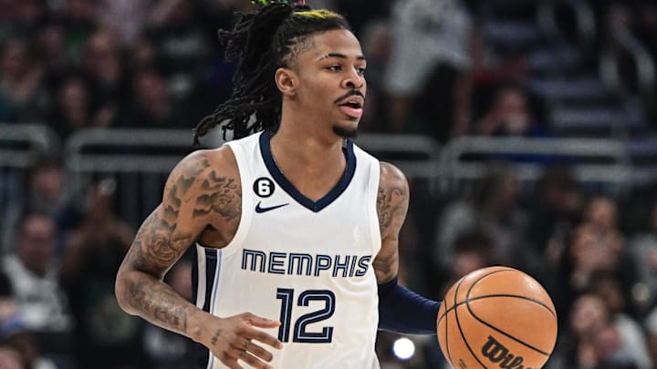 Apr 7, 2023; Milwaukee, Wisconsin, USA; Memphis Grizzlies guard Ja Morant (12) brings the ball down