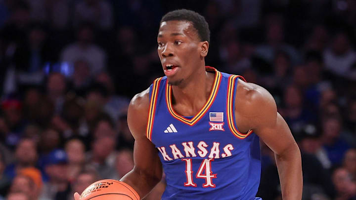Nov 18, 2025; New York, New York, USA; Kansas Jayhawks guard Melvin Council Jr. (14) dribbles up court during the first half against the Duke Blue Devils at Madison Square Garden. Mandatory Credit: Vincent Carchietta-Imagn Images