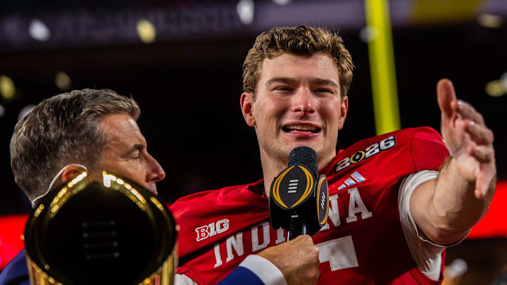 Indiana's Fernando Mendoza (15) talks to the crowd on the podium after the College Football Playoff National Championship college football game at Hard Rock Stadium in Miami Gardens on Monday, Jan. 19, 2026.
