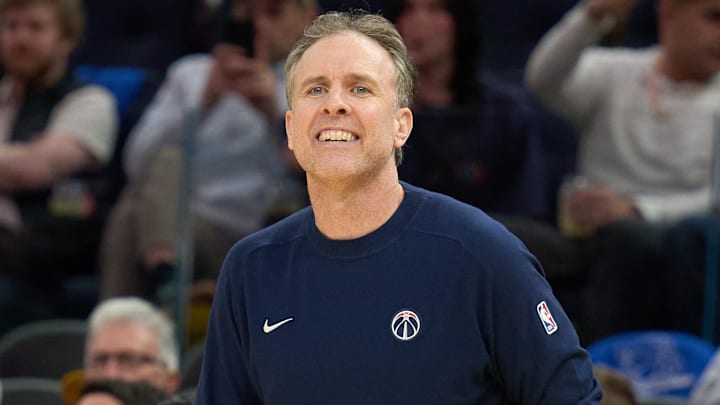 Jan 18, 2025; San Francisco, California, USA; Washington Wizards head coach Brian Keefe watches game play against the Golden State Warriors during the third quarter at Chase Center. Mandatory Credit: Robert Edwards-Imagn Images