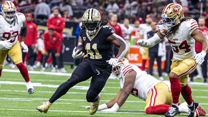Sep 14, 2025; New Orleans, Louisiana, USA; New Orleans Saints running back Alvin Kamara (41) runs against San Francisco 49ers linebacker Fred Warner (54) during the second half at Caesars Superdome. Mandatory Credit: Stephen Lew-Imagn Images Sep 14, 2025; New Orleans, Louisiana, USA; New Orleans Saints running back Alvin Kamara (41) runs against San Francisco 49ers linebacker Fred Warner (54) during the second half at Caesars Superdome. Mandatory Credit: Stephen Lew-Imagn Images