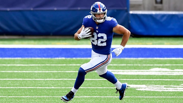 New York Giants tight end Kaden Smith (82) rushes in the first half. The New York Giants face the