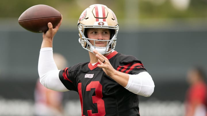 San Francisco 49ers quarterback Brock Purdy (13) works on his footwork in the pocket during the second day of training camp. San Francisco 49ers quarterback Brock Purdy (13) works on his footwork in the pocket during the second day of training camp.