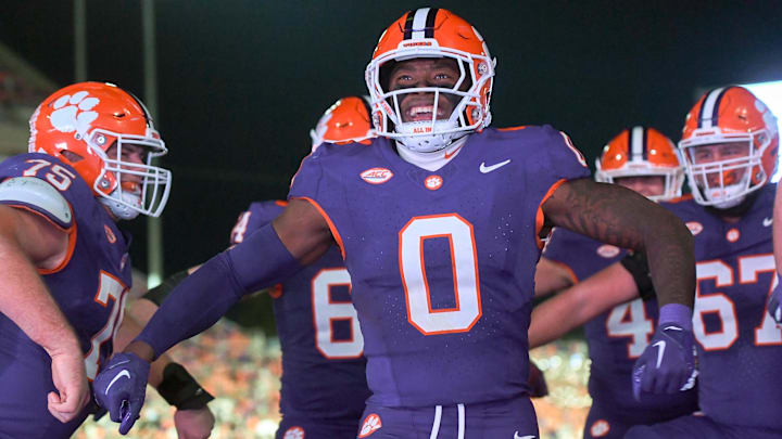 Nov 23, 2024; Clemson, South Carolina, USA; Clemson Tigers linebacker Barrett Carter (0) celebrates after scoring a touchdown against The Citadel Bulldogs during the fourth quarter at Memorial Stadium. Mandatory Credit: Ken Ruinard-Imagn Images Nov 23, 2024; Clemson, South Carolina, USA; Clemson Tigers linebacker Barrett Carter (0) celebrates after scoring a touchdown against The Citadel Bulldogs during the fourth quarter at Memorial Stadium. Mandatory Credit: Ken Ruinard-Imagn Images