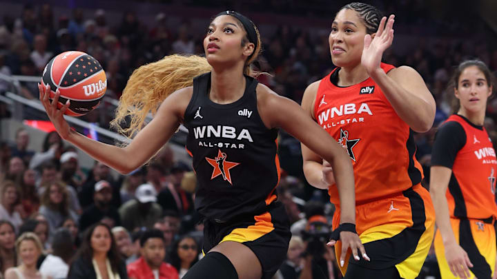 Jul 19, 2025; Indianapolis, IN, USA; Team Collier forward Angel Reese (5) controls the ball against Team Clark forward Brionna Jones (24) in the first quarter during the 2025 WNBA All Star Game at Gainbridge Fieldhouse. Mandatory Credit: Trevor Ruszkowski-Imagn Images