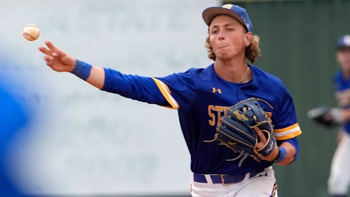 Stillwater's Ethan Holliday throws to first for an out during the high school baseball game between Fort Cobb-Broxton and Stillwater at Edmond Santa Fe High School in Edmond, Okla., Friday, April, 18, 2025.