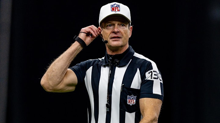 Referee Land Clark looks on during the first half of the game between the New Orleans Saints and the Las Vegas Raiders. Referee Land Clark looks on during the first half of the game between the New Orleans Saints and the Las Vegas Raiders.