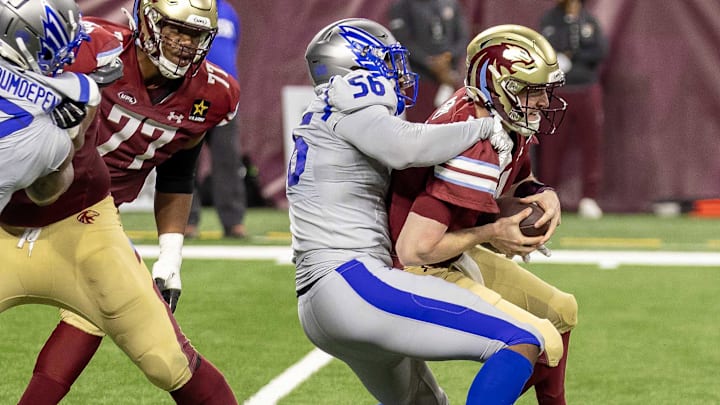 Mar 30, 2024; Detroit, MI, USA; St. Louis Battlehawks cornerback Tim Harris (4) is sacked by St. Louis Battlehawks linebacker Travis Feeney during the second half at Ford Field. Mandatory Credit: David Reginek-Imagn Images Mar 30, 2024; Detroit, MI, USA; St. Louis Battlehawks cornerback Tim Harris (4) is sacked by St. Louis Battlehawks linebacker Travis Feeney during the second half at Ford Field. Mandatory Credit: David Reginek-Imagn Images
