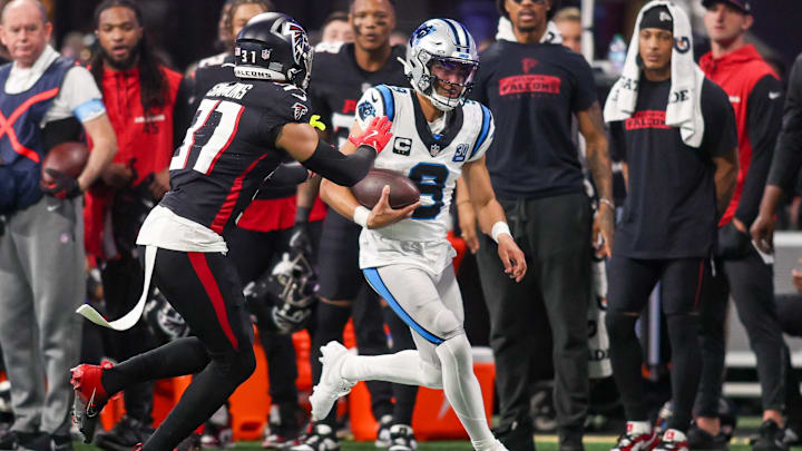 Jan 5, 2025; Atlanta, Georgia, USA; Carolina Panthers quarterback Bryce Young (9) scrambles against the Atlanta Falcons in the third quarter at Mercedes-Benz Stadium. Mandatory Credit: Brett Davis-Imagn Images Jan 5, 2025; Atlanta, Georgia, USA; Carolina Panthers quarterback Bryce Young (9) scrambles against the Atlanta Falcons in the third quarter at Mercedes-Benz Stadium. Mandatory Credit: Brett Davis-Imagn Images
