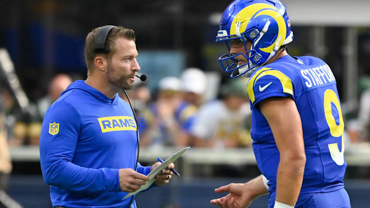 Oct 6, 2024; Inglewood, California, USA; Los Angeles Rams head coach Sean McVay talks to quarterback Matthew Stafford (9) during the third quarter against the Green Bay Packers at SoFi Stadium. Mandatory Credit: Robert Hanashiro-Imagn Images Oct 6, 2024; Inglewood, California, USA; Los Angeles Rams head coach Sean McVay talks to quarterback Matthew Stafford (9) during the third quarter against the Green Bay Packers at SoFi Stadium. Mandatory Credit: Robert Hanashiro-Imagn Images