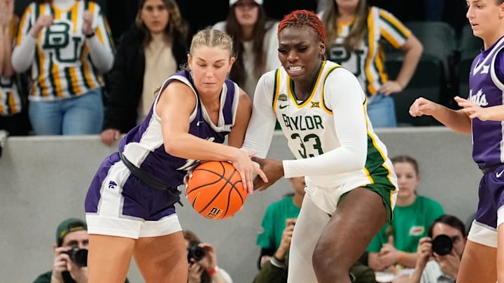 Jan 22, 2024; Waco, Texas, USA; Kansas State Wildcats guard Gabby Gregory (12) and Baylor Lady Bears guard Aijha Blackwell fight for the ball.