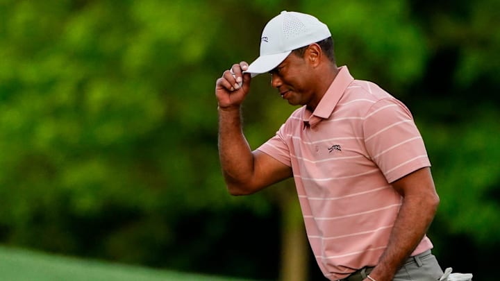 Apr 11, 2024; Augusta, Georgia, USA; Tiger Woods walks up to the no. 12 tee box during the first of the Masters. 