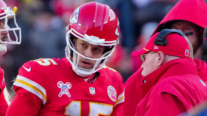 Dec 21, 2024; Kansas City, Missouri, USA; Kansas City Chiefs quarterback Patrick Mahomes (15) talks with head coach Andy Reid during the second half against the Houston Texans at GEHA Field at Arrowhead Stadium. Mandatory Credit: Denny Medley-Imagn Images