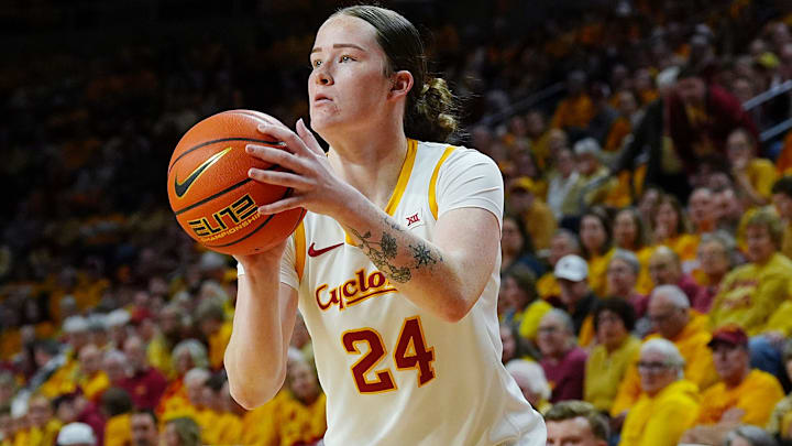 Iowa State Cyclones' forward Addy Brown (24) takes a three-point shot against Oklahoma State Cowgirls during the first quarter in the senior day women basketball at Hilton Coliseum on February. 25, 2026, in Ames, Iowa.