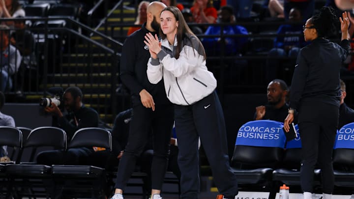 May 28, 2025; Washington, District of Columbia, USA; Indiana Fever guard Caitlin Clark (22) cheers from the bench in the first quarter against the Washington Mystics at Entertainment & Sports Arena. Mandatory Credit: Emily Faith Morgan-Imagn Images May 28, 2025; Washington, District of Columbia, USA; Indiana Fever guard Caitlin Clark (22) cheers from the bench in the first quarter against the Washington Mystics at Entertainment & Sports Arena. Mandatory Credit: Emily Faith Morgan-Imagn Images
