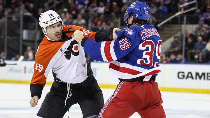 Feb 26, 2026; New York, New York, USA;  Philadelphia Flyers right wing Garnet Hathaway (19) and New York Rangers center Sam Carrick (39) at Madison Square Garden. Mandatory Credit: Wendell Cruz-Imagn Images