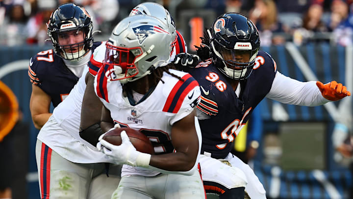 Nov 10, 2024; Chicago, Illinois, USA; New England Patriots running back Rhamondre Stevenson (38) rushes the ball against the Chicago Bears during the second half at Soldier Field. Mandatory Credit: Mike Dinovo-Imagn Images Nov 10, 2024; Chicago, Illinois, USA; New England Patriots running back Rhamondre Stevenson (38) rushes the ball against the Chicago Bears during the second half at Soldier Field. Mandatory Credit: Mike Dinovo-Imagn Images