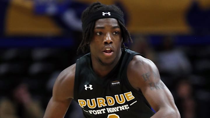 Dec 20, 2023; Pittsburgh, Pennsylvania, USA; IPFW Mastodons guard Rasheed Bello (0) dribbles the ball up the court. 