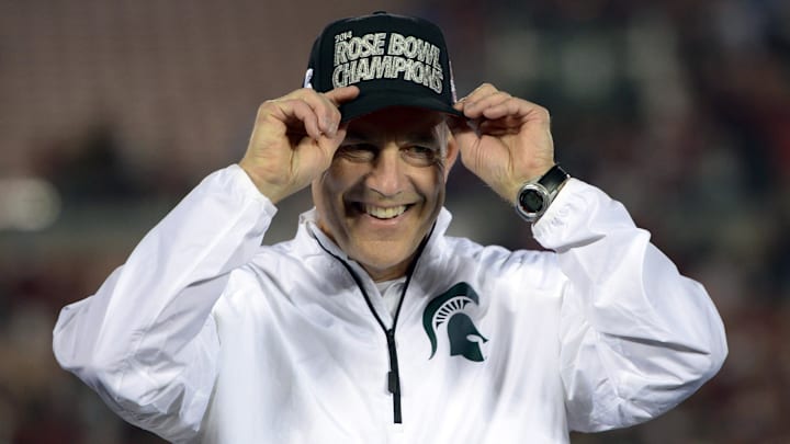 Jan 1, 2014; Pasadena, CA, USA; Michigan State Spartans coach Mark Dantonio poses after the 100th Rose Bowl against the Stanford Cardinal. Michigan State defeated Stanford 24-20. Mandatory Credit: Kirby Lee-Imagn Images