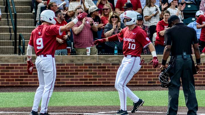 Oklahoma's Camden Johnson celebrates with Brendan Brock Oklahoma's Camden Johnson celebrates with Brendan Brock