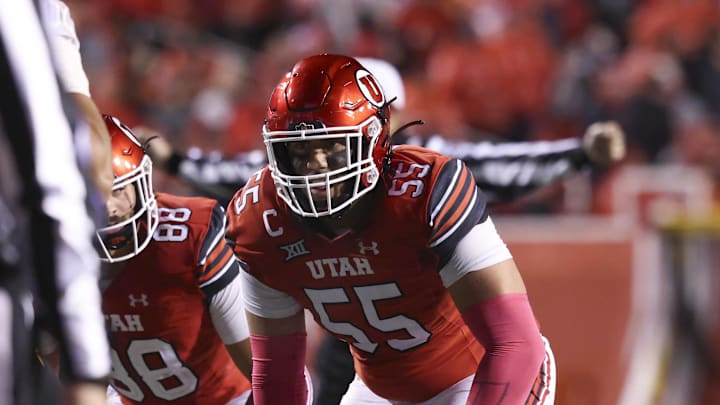 Utah Utes offensive lineman Spencer Fano (55) and Utah Utes offensive lineman waits for the play during the third quarter of a game at Rice-Eccles Stadium. Utah Utes offensive lineman Spencer Fano (55) and Utah Utes offensive lineman waits for the play during the third quarter of a game at Rice-Eccles Stadium.