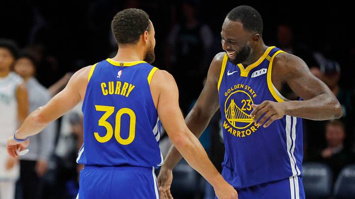 Oct 28, 2026; Minneapolis, Minnesota, USA;  Golden State Warriors guard Stephen Curry (30) hugs forward Draymond Green (23) after they defeat the Minnesota Timberwolves at Target Center.  Mandatory Credit: Bruce Kluckhohn-Imagn Images