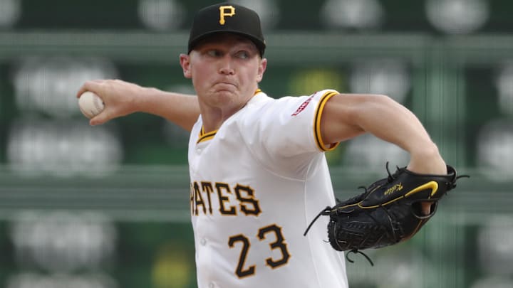 Aug 26, 2024; Pittsburgh, Pennsylvania, USA;  Pittsburgh Pirates starting pitcher Mitch Keller (23) delivers a pitch against the Chicago Cubs during the first inning at PNC Park.