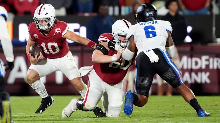 Oklahoma quarterback John Mateer scrambles in the fourth quarter against Kentucky. Oklahoma quarterback John Mateer scrambles in the fourth quarter against Kentucky.