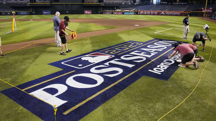 The 2023 Postseason field logo is painted for the NLCS Game 3 at Chase Field in Phoenix on Oct. 18, 2023. The 2023 Postseason field logo is painted for the NLCS Game 3 at Chase Field in Phoenix on Oct. 18, 2023.