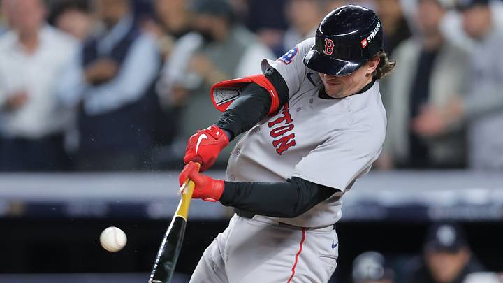 Sep 29, 2026; Bronx, New York, USA; Boston Red Sox catcher Adley Rutschman (31) hits a single during the first inning against the New York Yankees during game one of the Wildcard round for the 2026 MLB Playoffs at Yankee Stadium. Mandatory Credit: Brad Penner-Imagn Images Sep 29, 2026; Bronx, New York, USA; Boston Red Sox catcher Adley Rutschman (31) hits a single during the first inning against the New York Yankees during game one of the Wildcard round for the 2026 MLB Playoffs at Yankee Stadium. Mandatory Credit: Brad Penner-Imagn Images