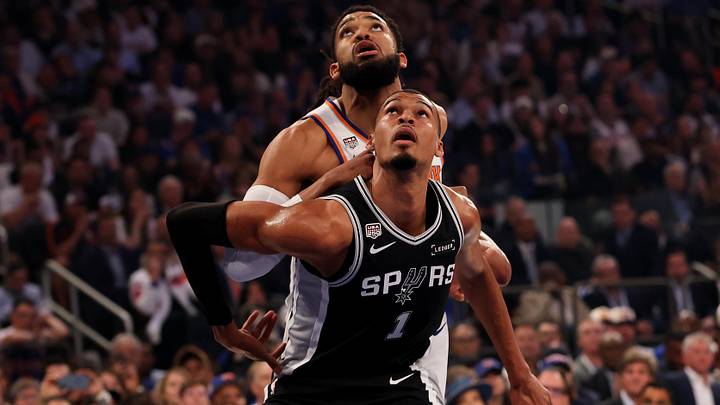 Jun 8, 2026; New York, New York, USA; New York Knicks center Mitchell Robinson (23) vies for position against San Antonio Spurs forward Victor Wembanyama (1) during game three of the 2026 NBA Finals in the first quarter at Madison Square Garden. Mandatory Credit: Geoff Burke-Imagn Images