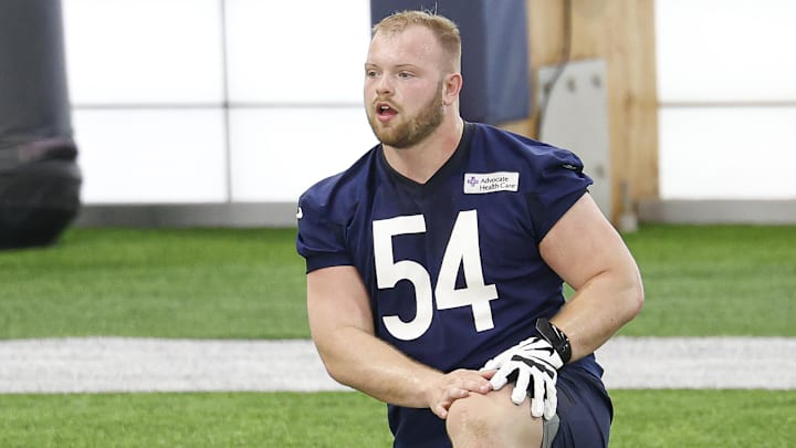 May 8, 2026; Lake Forest, IL, USA; Chicago Bears offensive lineman Logan Jones (54) stretches during Rookie Minicamp at Halas Hall. Mandatory Credit: Kamil Krzaczynski-Imagn Images