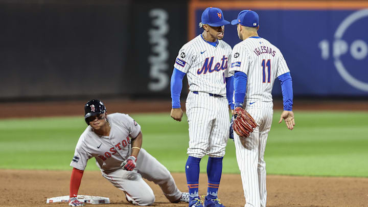 Sep 3, 2024; New York City, New York, USA; New York Mets shortstop Francisco Lindor (12) and second baseman Jose Iglesias (11) after completing an inning ending double play in the eighth inning against the Boston Red Sox at Citi Field. Mandatory Credit: Wendell Cruz-Imagn Images Sep 3, 2024; New York City, New York, USA; New York Mets shortstop Francisco Lindor (12) and second baseman Jose Iglesias (11) after completing an inning ending double play in the eighth inning against the Boston Red Sox at Citi Field. Mandatory Credit: Wendell Cruz-Imagn Images