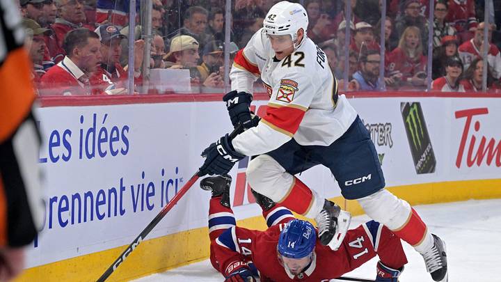 Apr 7, 2026; Montreal, Quebec, CAN; Florida Panthers defenseman Gustav Forsling (42) takes the puck away from Montreal Canadiens forward Nick Suzuki (14) during the overtime period at the Bell Centre. Mandatory Credit: Eric Bolte-Imagn Images Apr 7, 2026; Montreal, Quebec, CAN; Florida Panthers defenseman Gustav Forsling (42) takes the puck away from Montreal Canadiens forward Nick Suzuki (14) during the overtime period at the Bell Centre. Mandatory Credit: Eric Bolte-Imagn Images