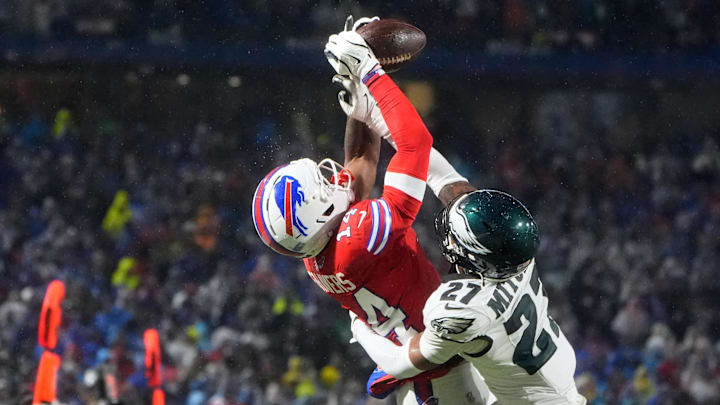 Buffalo Bills wide receiver Tyrell Shavers (14) leaps to catch a thirty-two yard pass thrown by quarterback Josh Allen (not pictured) against Philadelphia Eagles cornerback Quinyon Mitchell (27) during the third quarter at Highmark Stadium. Buffalo Bills wide receiver Tyrell Shavers (14) leaps to catch a thirty-two yard pass thrown by quarterback Josh Allen (not pictured) against Philadelphia Eagles cornerback Quinyon Mitchell (27) during the third quarter at Highmark Stadium.