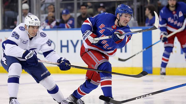 Oct 13, 2026; New York, New York, USA; New York Rangers left wing Alexis Lafreniere (13) follows through on a shot against Tampa Bay Lightning right wing Ilya Mikheyev (95) during the third period at Madison Square Garden. Mandatory Credit: Brad Penner-Imagn Images Oct 13, 2026; New York, New York, USA; New York Rangers left wing Alexis Lafreniere (13) follows through on a shot against Tampa Bay Lightning right wing Ilya Mikheyev (95) during the third period at Madison Square Garden. Mandatory Credit: Brad Penner-Imagn Images