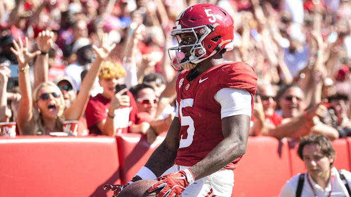Oct 12, 2024; Tuscaloosa, Alabama, USA; Alabama Crimson Tide wide receiver Germie Bernard (5) scores a touchdown against the South Carolina Gamecocks during the fourth quarter at Bryant-Denny Stadium. Mandatory Credit: Will McLelland-Imagn Images