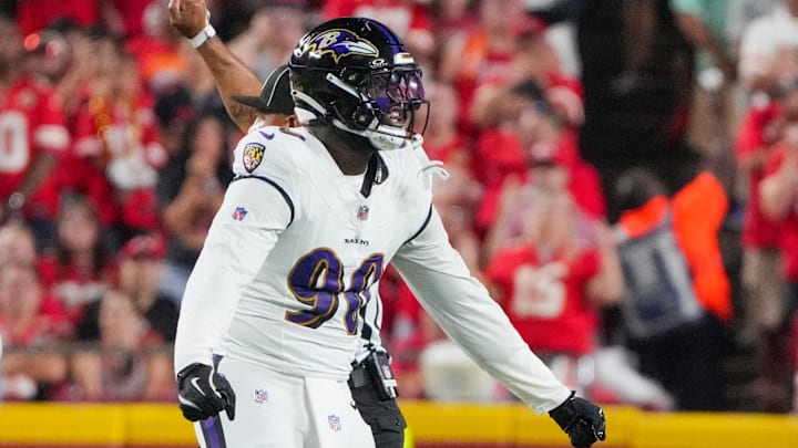 Sep 5, 2024; Kansas City, Missouri, USA; Baltimore Ravens linebacker David Ojabo (90) celebrates after a sack against the Kansas City Chiefs during the first half at GEHA Field at Arrowhead Stadium. Mandatory Credit: Denny Medley-Imagn Images