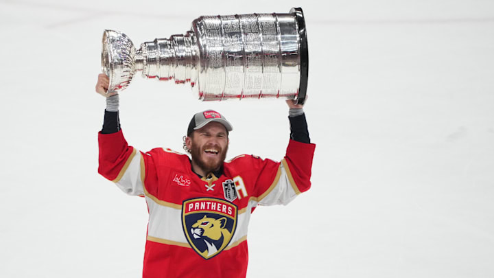 Florida Panthers forward Matthew Tkachuk hoists the Stanley Cup after defeating Edmonton Oilers in game seven of the 2024 Stanley Cup Final
