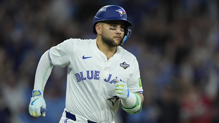 Nov 1, 2025; Toronto, Ontario, CAN; Toronto Blue Jays designated hitter Bo Bichette (11) runs after hitting a three run home run against the Los Angeles Dodgers in the third inning during game seven of the 2025 MLB World Series at Rogers Centre. Mandatory Credit: John E. Sokolowski-Imagn Images