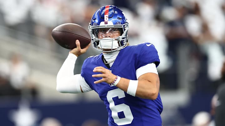 New York Giants quarterback Jaxson Dart (6) warms up before the game against the Dallas Cowboys at AT&T Stadium. 