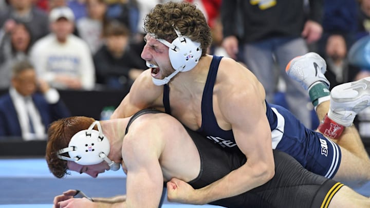 Penn State's Mitchell Mesenbrink celebrates his win against Iowa's Michael Caliendo at the NCAA Wrestling Championships.